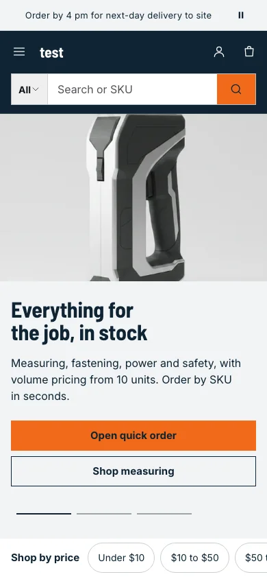 Toolhouse preset of the Manifest theme on a phone: a navy header with a full-width search field and an orange button, above a photo of a laser level.